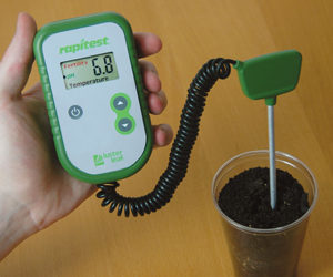 Using a pH meter to test garden soil